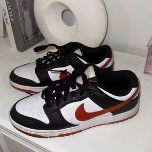 Nike Black and White Sneakers with Red Swoosh